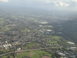 The town of Kontich, the A1 road and the Beneden-Nete river, viewed from the airplane from Antwerp