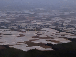 Greenhouses at the northeast side of the city, viewed from the airplane from Antwerp, at sunset