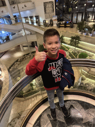 Max at the elevator of the Rixos Downtown Antalya hotel, with a view on the central hall
