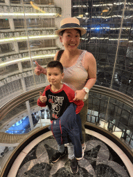Miaomiao and Max at the elevator of the Rixos Downtown Antalya hotel, with a view on the central hall