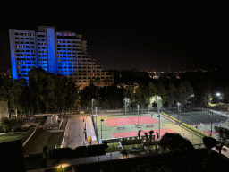 Sports fields at the Rixos Downtown Antalya hotel and the Özkaymak Falez Hotel, viewed from the balcony of our room, by night
