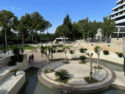 Pond with fountains and the terrace of the Turunc restaurant at the garden of the Rixos Downtown Antalya hotel