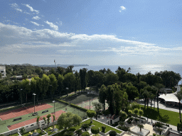 Sports fields and the Tropic Bar at the garden of the Rixos Downtown Antalya hotel, the city center and the Gulf of Antalya, viewed from the balcony of our room