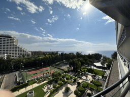 Sports fields and the Tropic Bar at the garden of the Rixos Downtown Antalya hotel, the Özkaymak Falez Hotel, the city center and the Gulf of Antalya, viewed from the balcony of our room