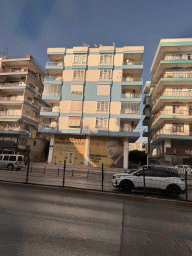 Photograph of Recep Tayyip Erdogan at the front of a building at the Mevlana Caddesi street, viewed from the taxi