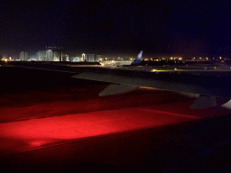 Airplane at Antalya Airport, viewed from the airplane to Antwerp, by night