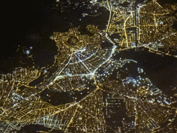 The city of Afyonkarahisar with Afyonkarahisar Castle, viewed from the airplane to Antwerp, by night