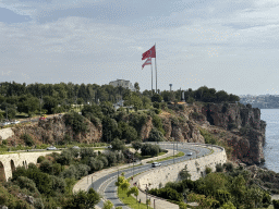The Konyaalti Plaji road and flags, viewed from the path at the top of the elevator from the Atatürk Kültür Park to the Beach Park