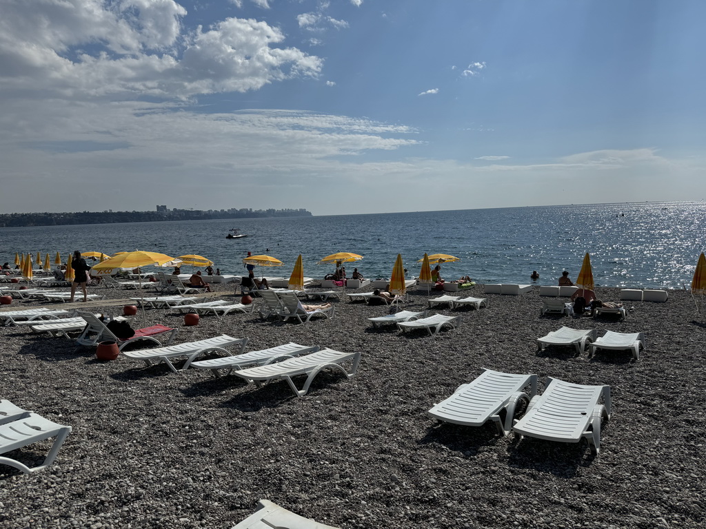 The beach at the Beach Park, with a view on the city center and the Gulf of Antalya