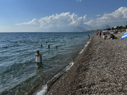 Miaomiao at the beach at the Beach Park, with a view on the Bey Mountains and the Gulf of Antalya