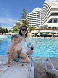 Miaomiao and Max with drinks at the swimming pool at the garden of the Rixos Downtown Antalya hotel