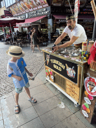 Max with an ice cream salesman at the Cumhuriyet Caddesi street