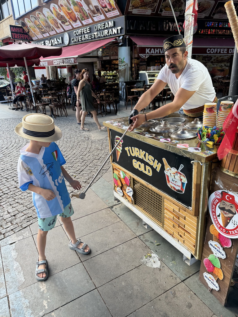 Max with an ice cream salesman at the Cumhuriyet Caddesi street