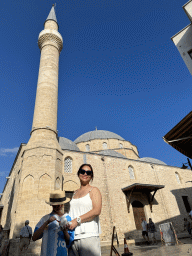 Miaomiao and Max at the Uzun Çarsi Sokak alley, with a view on the southwest side and minaret of the Tekeli Mehmet Pasa Mosque
