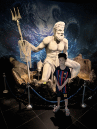 Max with a Poseidon statue at the entrance at the First Floor of the Aquarium at the Antalya Aquarium