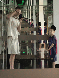 Tim and Max with mirrors at the Exit Hall of the World`s Biggest Tunnel Aquarium at the Ground Floor of the Aquarium at the Antalya Aquarium