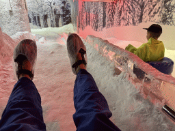 Tim and Max sliding down on tyres at the Snow World at the Antalya Aquarium