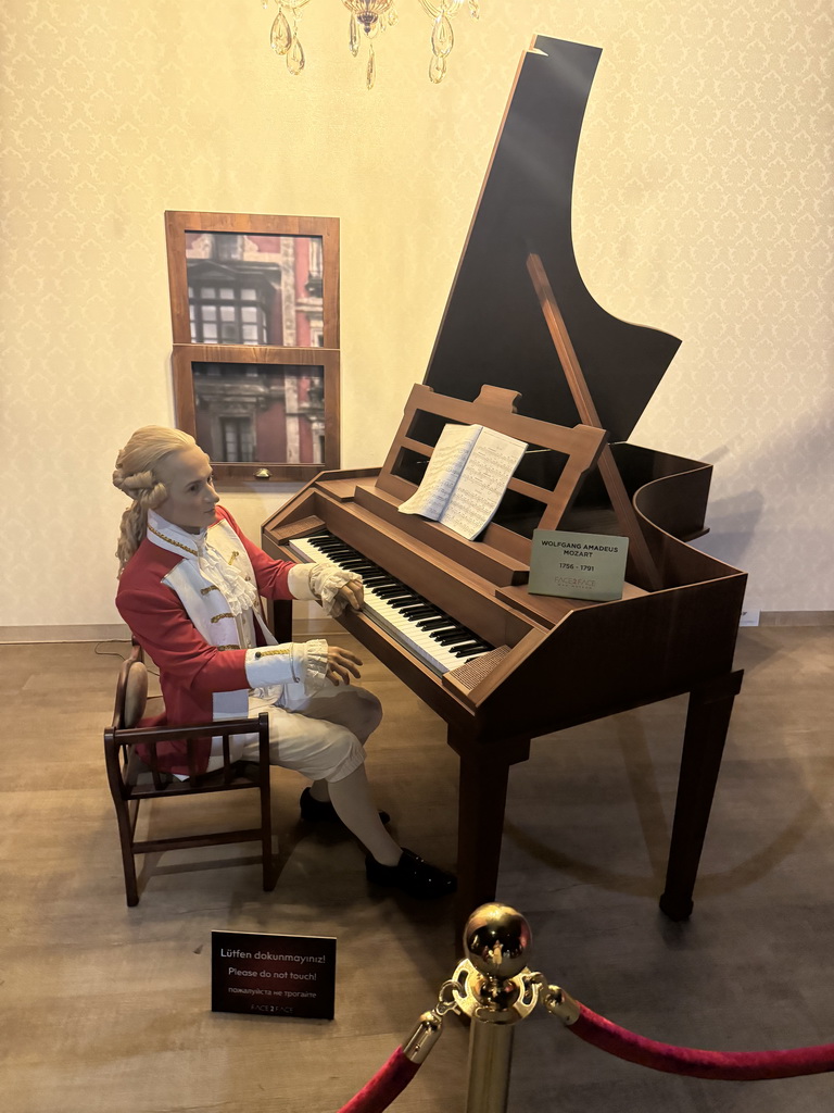 Statue of Wolfgang Amadeus Mozart at the Face 2 Face Wax Museum at the Antalya Aquarium, with explanation