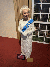 Statue of Queen Elizabeth II at the Face 2 Face Wax Museum at the Antalya Aquarium, with explanation