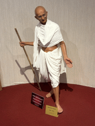 Statue of Mahatma Gandhi at the Face 2 Face Wax Museum at the Antalya Aquarium, with explanation