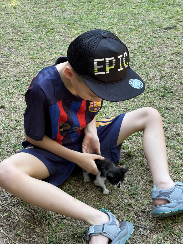 Max with a kitten at the Cat Shelter at the Atatürk Kültür Park