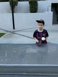 Max playing table tennis at the sports fields at the garden of the Rixos Downtown Antalya hotel