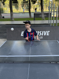 Max playing table tennis at the sports fields at the garden of the Rixos Downtown Antalya hotel