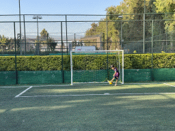 Max playing football at the sports fields at the garden of the Rixos Downtown Antalya hotel