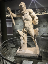 Statue of Marsyas at the Perge Theater Gallery at the ground floor of the Antalya Archeology Museum, with explanation
