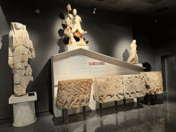 Statues and reliefs at the Hall of the Cult of the Dead at the ground floor of the Antalya Archeology Museum, with explanation