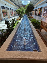 Pond with fountains at the ground floor of the Mall of Antalya