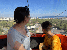 Miaomiao and Max at the Tünektepe Teleferik Tesisleri cable car, with a view on the lower station at the Antalya Kemer Yolu road, the city center, the Gulf of Antalya and the Setur Antalya Marina