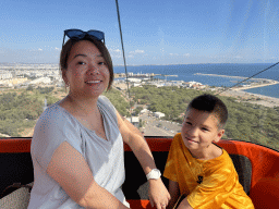 Miaomiao and Max at the Tünektepe Teleferik Tesisleri cable car, with a view on the lower station at the Antalya Kemer Yolu road, the west side of the city, the city center, the Gulf of Antalya and the Setur Antalya Marina