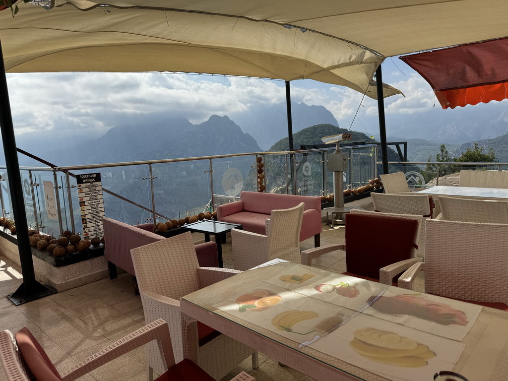 Terrace of the restaurant at the Tünektepe Teleferik Tesisleri upper station at the Tünek Tepe hill, with a view on the hills on the southwest side