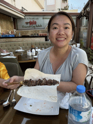 Miaomiao eating kebab at the Halis Erzurum Cag Kebap Restaurant