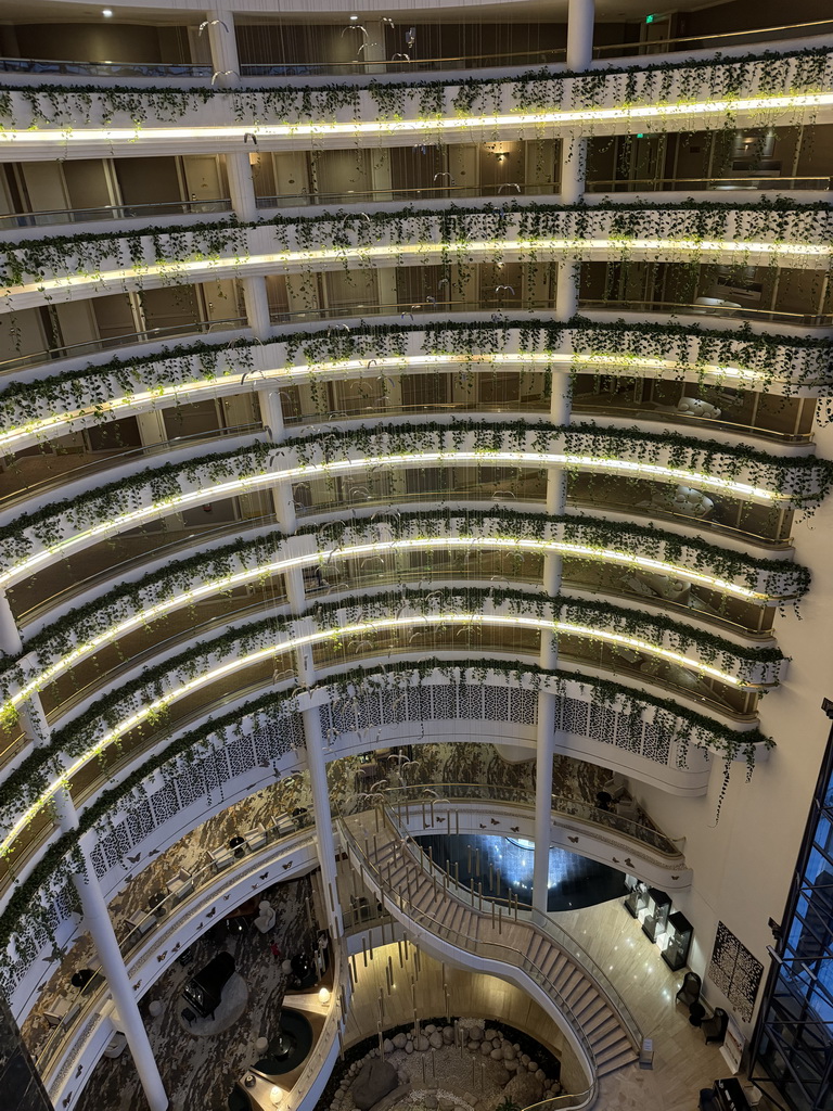 Central hall of the Rixos Downtown Antalya hotel, viewed from the top floor, by night