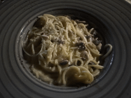 Spaghetti on Parmesan wheel at the terrace of the Turunc restaurant at the garden of the Rixos Downtown Antalya hotel, by night