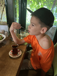 Max with a Turkish tea at the Pasa Bey Kebap restaurant
