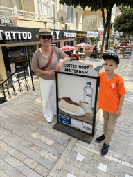 Miaomiao and Max with a sign of the Coffeeshop Amsterdam café at the Isiklar Caddesi street