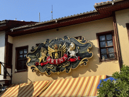 Coat of arms at the facade of the Tudors Arena pub at the Pasa Cami Sokak alley