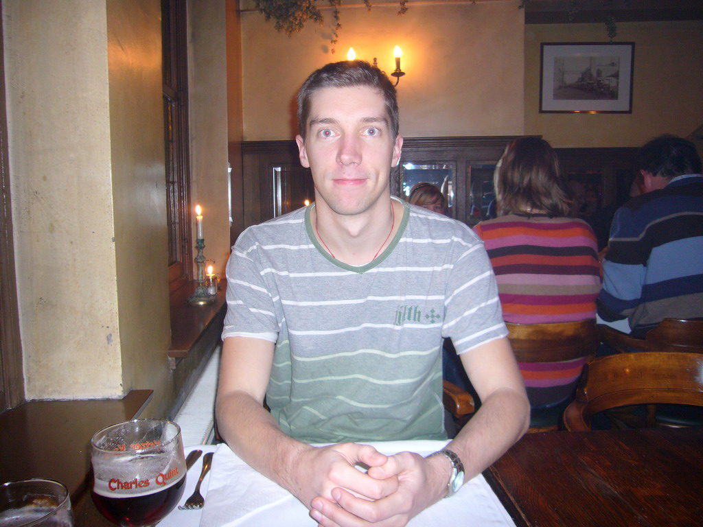 Tim with a Charles Quint beer at the De Valk restaurant