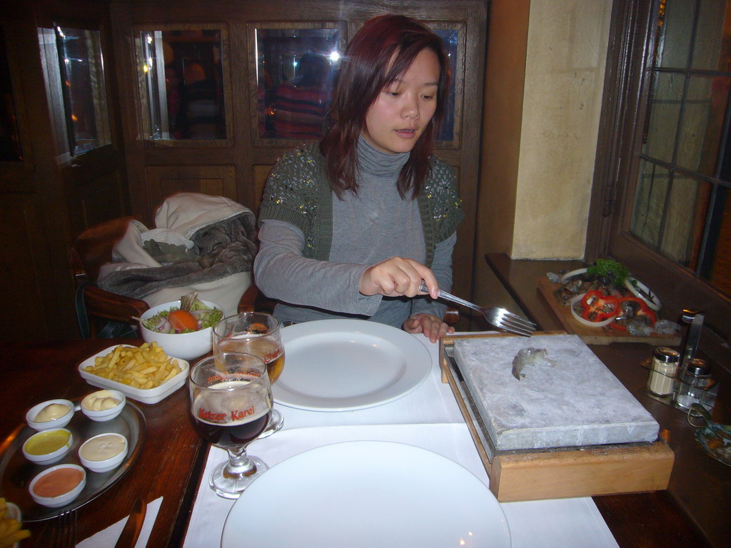 Miaomiao having dinner at the De Valk restaurant