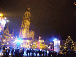 The Grote Markt square with the Brabo Fountain, an ice rink, christmas trees and the Cathedral of Our Lady, by night