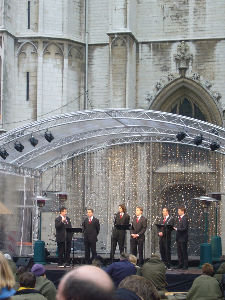 Christmas choir in front of the Cathedral of Our Lady at the Handschoenmarkt square