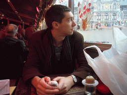 Tim at a restaurant at the Grote Markt square