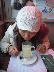 Miaomiao having a drink at the Grote Markt square