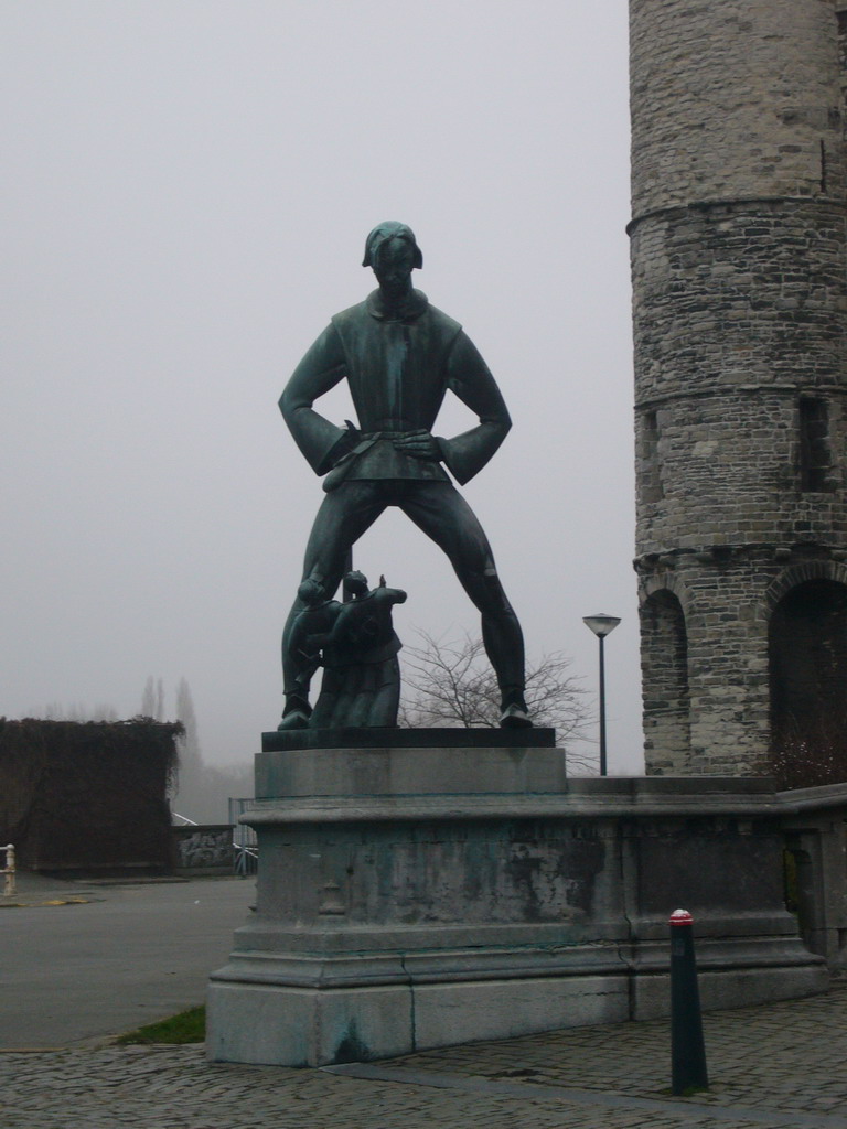 The Lange Wapper statue in front of the Het Steen castle at the Steenplein square