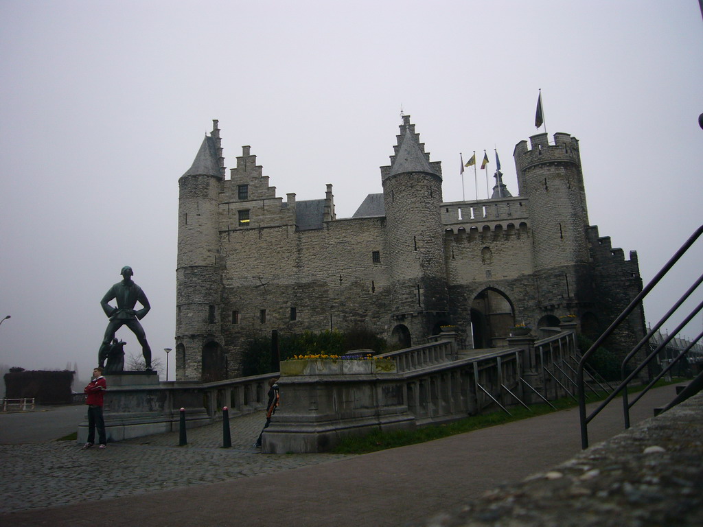 The Lange Wapper statue and the Het Steen castle at the Steenplein square