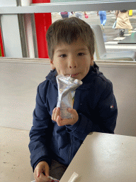 Max having a drink at the Medina Burger restaurant at the Koningin Astridplein square