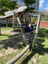 Max on a rope bridge at the Bear Valley playground at the Antwerp Zoo